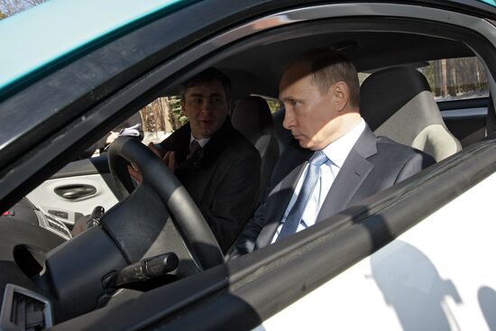 Prime Minister Vladimir Putin drives new Yo-Mobile car
