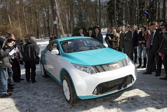 Prime Minister Vladimir Putin drives new Yo-Mobile car