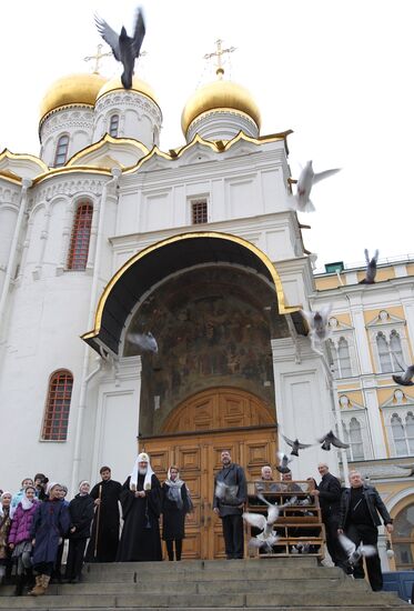 Patriarch Kirill and Svetlana Medvedev release doves