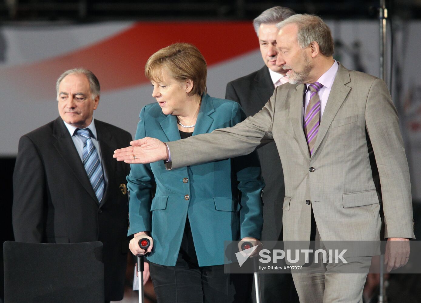 Georges Guelzec, Angela Merkel, Rainer Brechtken