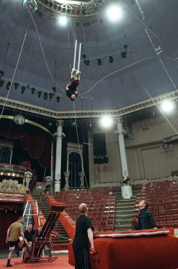 Teeter board acrobats