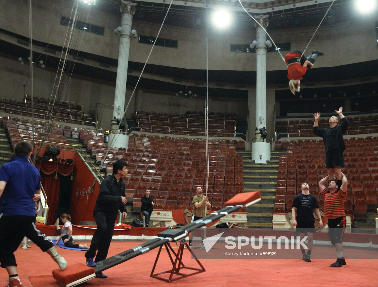 Teeter board acrobats