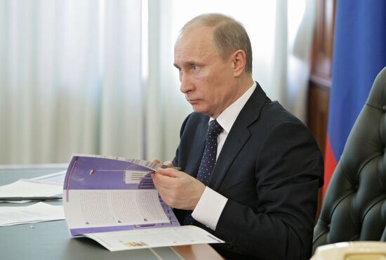 Russian Prime Minister Vladimir Putin holds teleconference