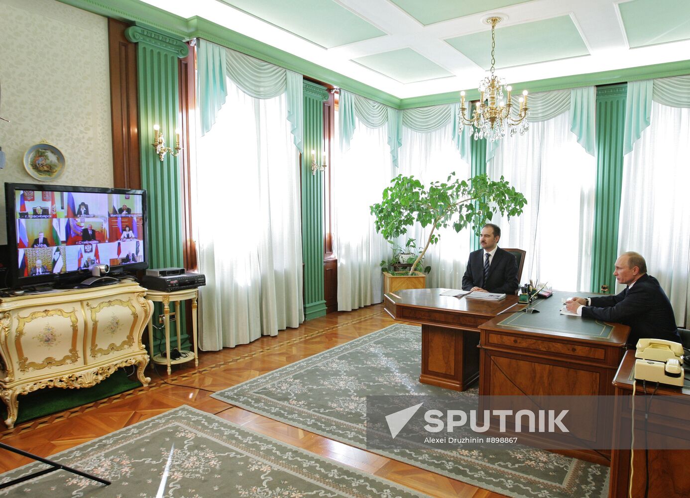 Russian Prime Minister Vladimir Putin holds teleconference
