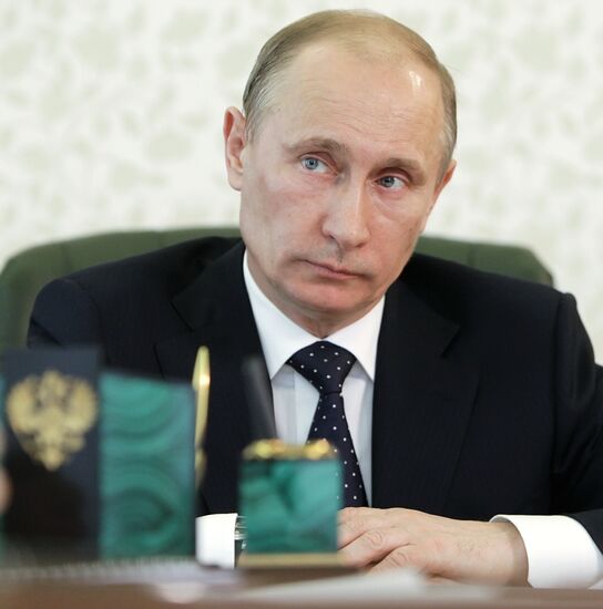 Russian Prime Minister Vladimir Putin holds teleconference