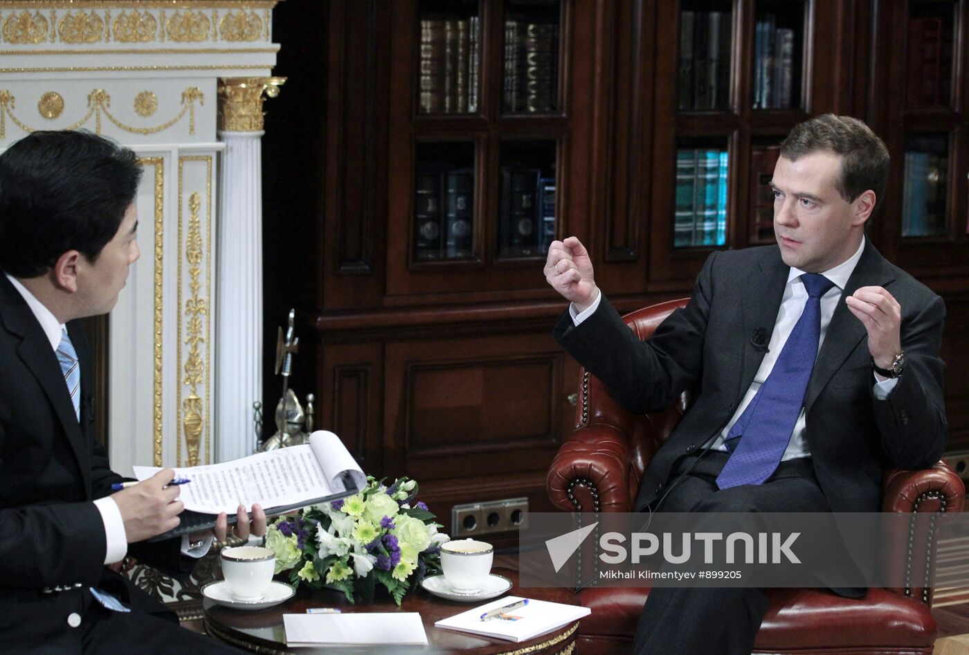 President Dmitry Medvedev (right) seen in his Gorki residence, Moscow suburbs, giving a Chinese Central Television interview to Shui Jun-yi, Global Watch program producer and anchorman, April 12, 2011. Location: Russia, Moscow region. Author: Mikhail Klimentyev/Sputnik. Dmitry Medvedev interviewed by CCTV