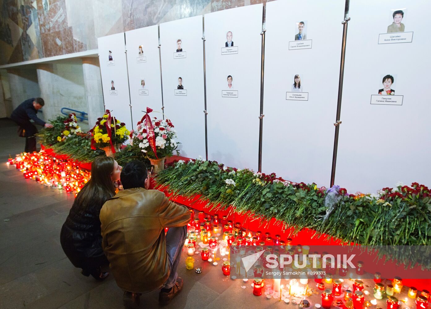 Laying flowers in memory of those killed in Minsk explosion