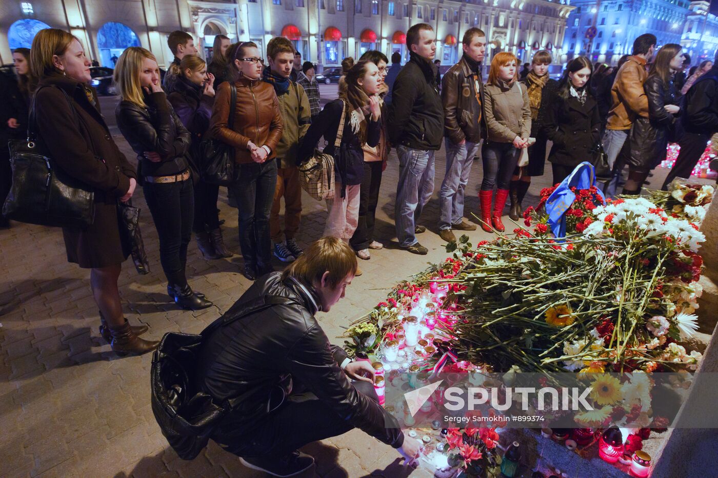 Laying flowers in memory of those killed in Minsk explosion