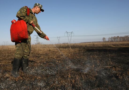 Burning off dry grass in Altai Territory