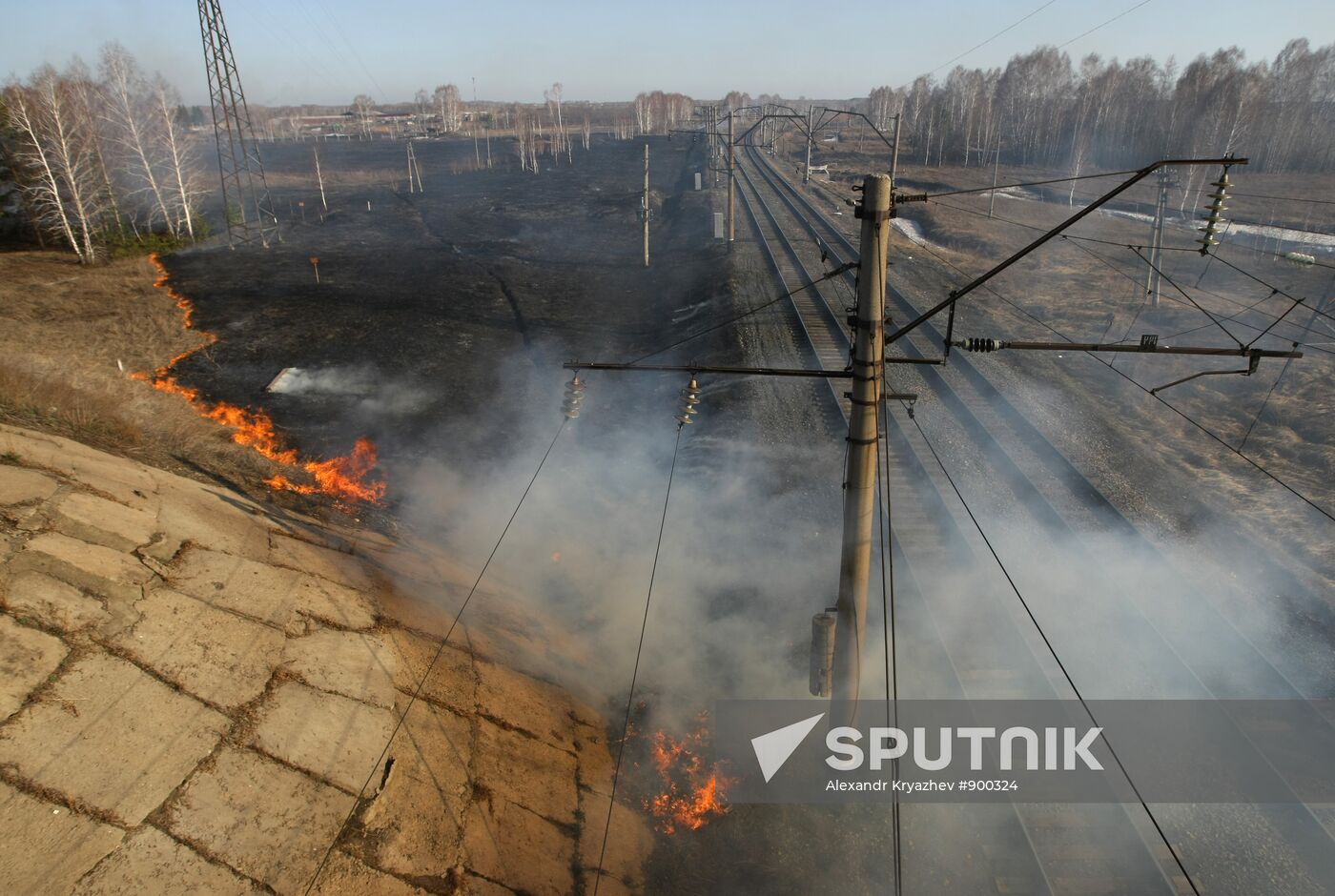 Burning off dry grass in Altai Territory