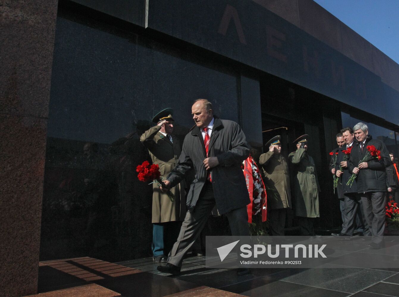 Laying flowers at mausoleum of VI Lenin