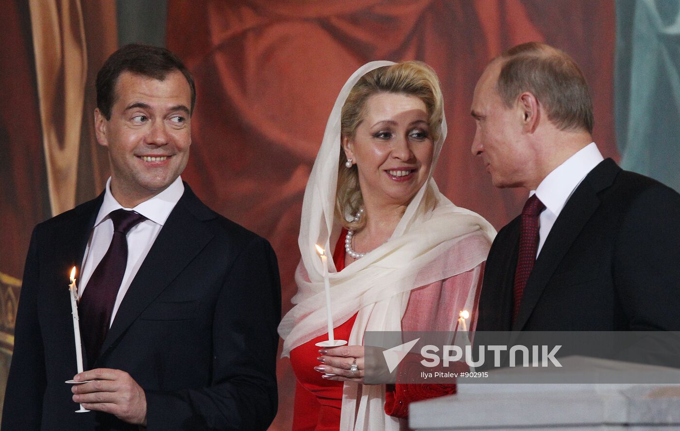 Dmitry Medvedev and Vladimir Putin attend Easter service