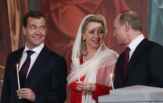 Dmitry Medvedev and Vladimir Putin attend Easter service