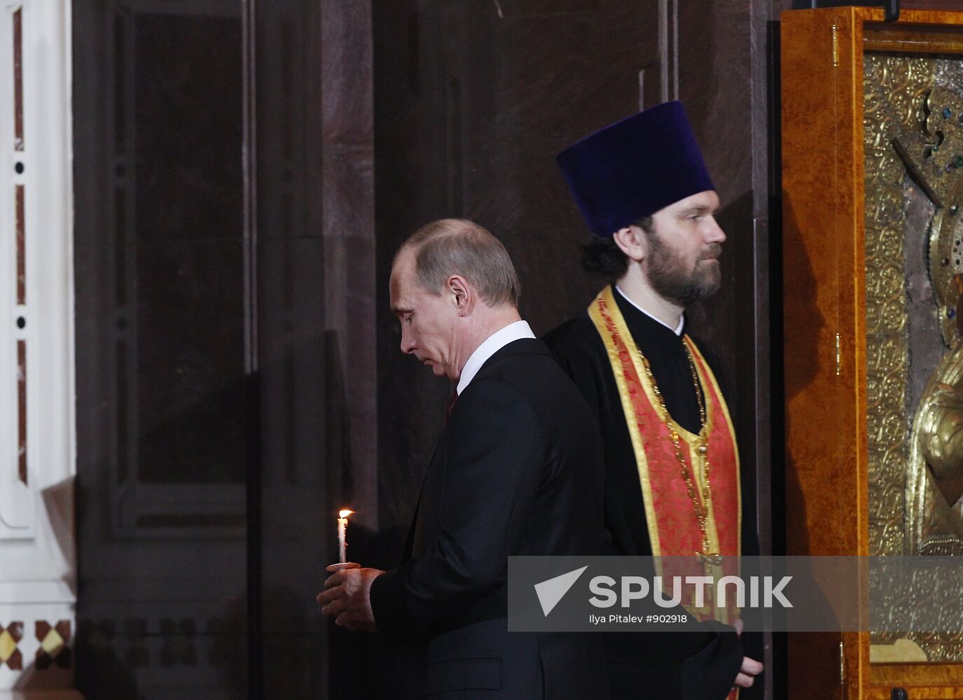 Vladimir Putin attends Easter service