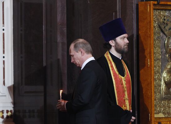 Vladimir Putin attends Easter service