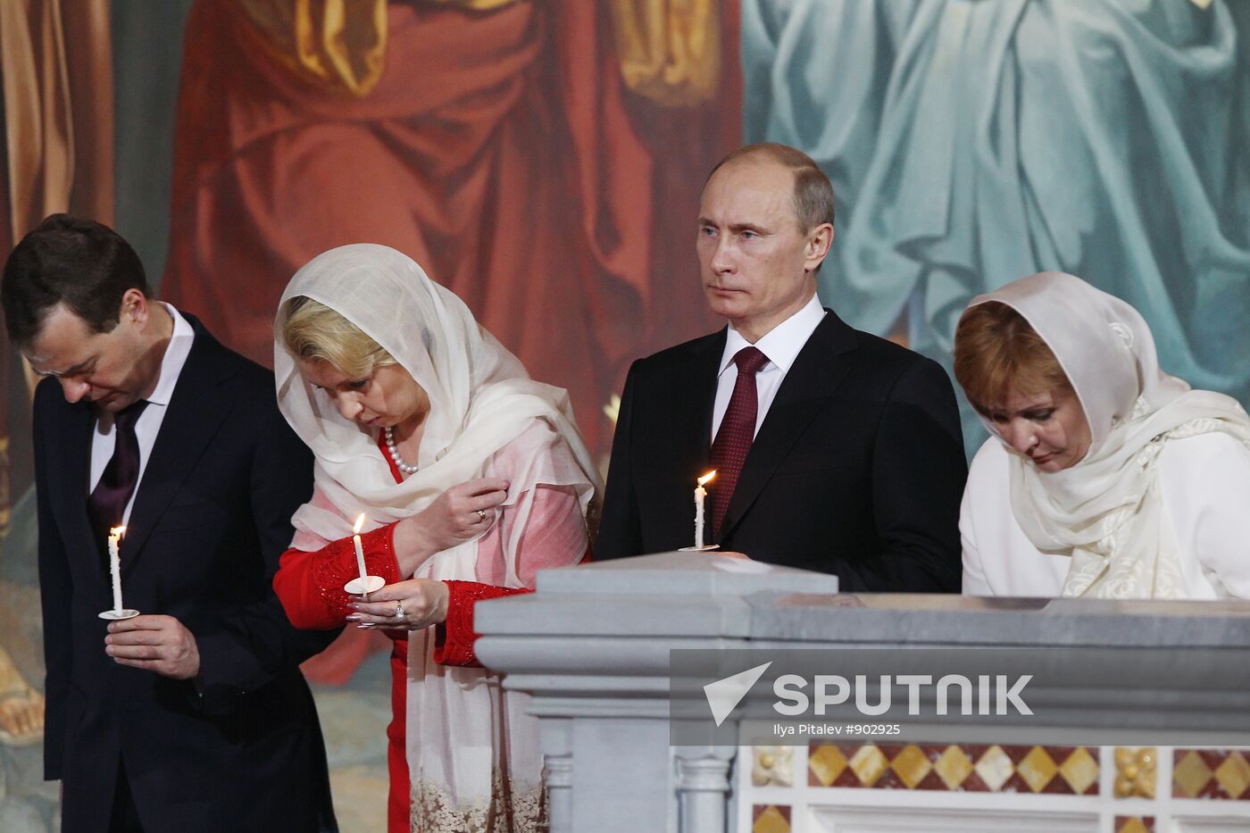 Dmitry Medvedev and Vladimir Putin attend Easter service