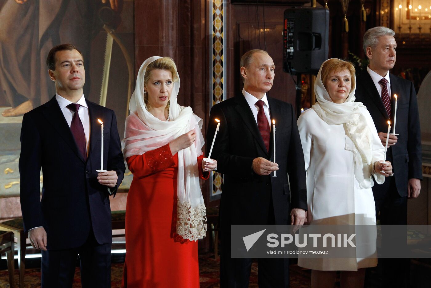 Dmitry Medvedev and Vladimir Putin attend Easter service