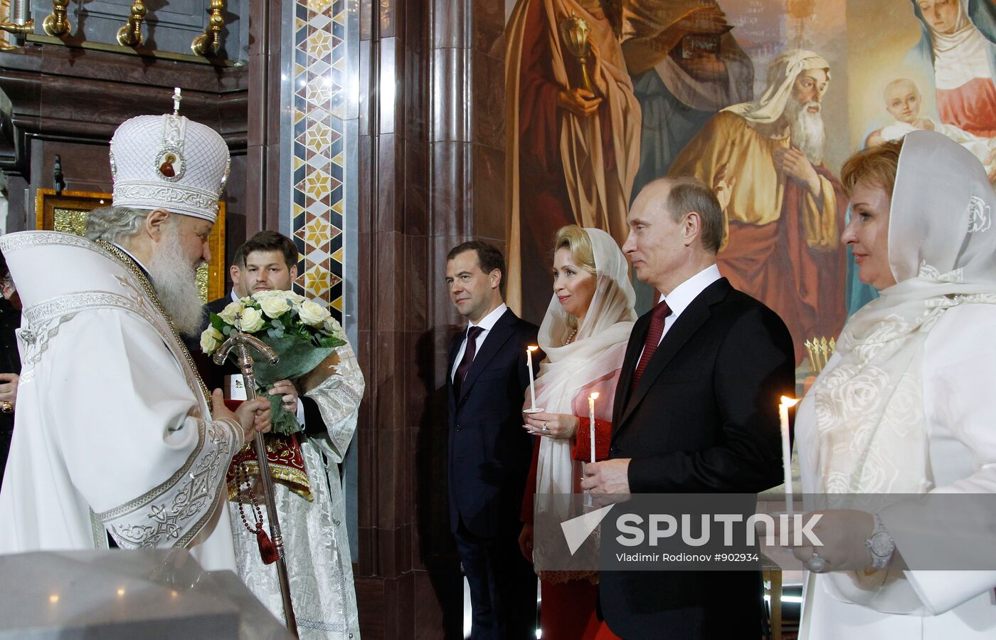 Dmitry Medvedev and Vladimir Putin attend Easter service