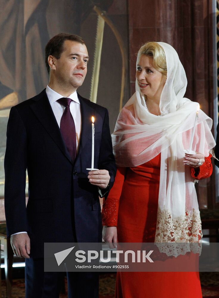 Dmitry Medvedev and Vladimir Putin attend Easter service