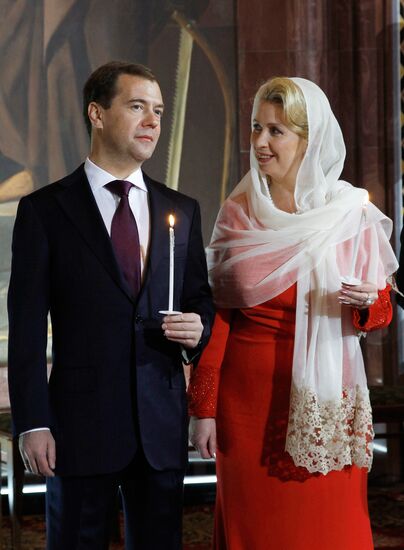 Dmitry Medvedev and Vladimir Putin attend Easter service