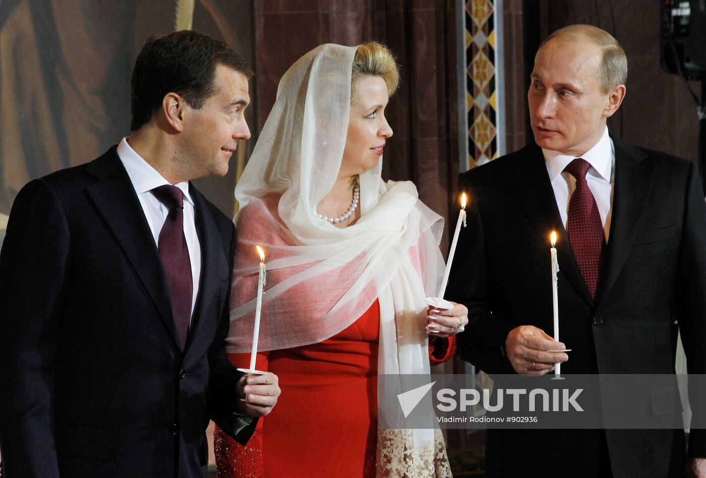 Dmitry Medvedev and Vladimir Putin attend Easter service