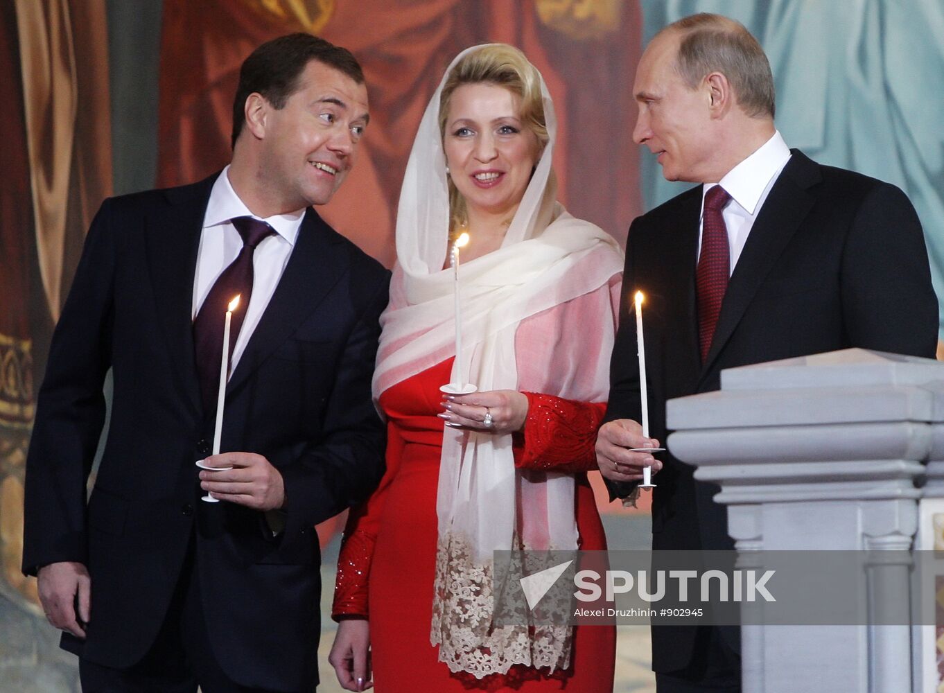 Dmitry Medvedev and Vladimir Putin attend Easter service