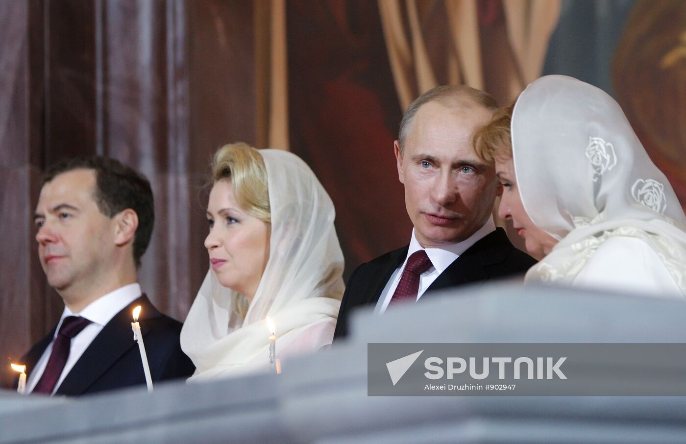 Dmitry Medvedev and Vladimir Putin attend Easter service