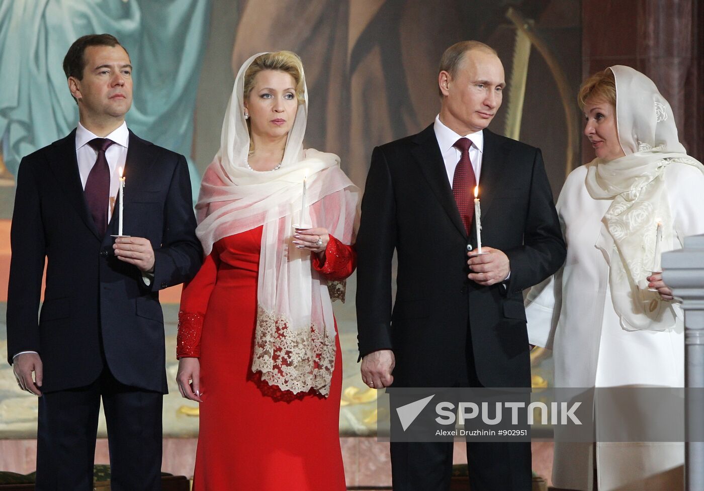 Dmitry Medvedev and Vladimir Putin attend Easter service