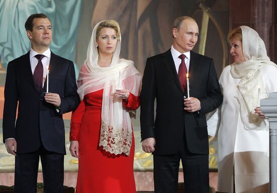 Dmitry Medvedev and Vladimir Putin attend Easter service