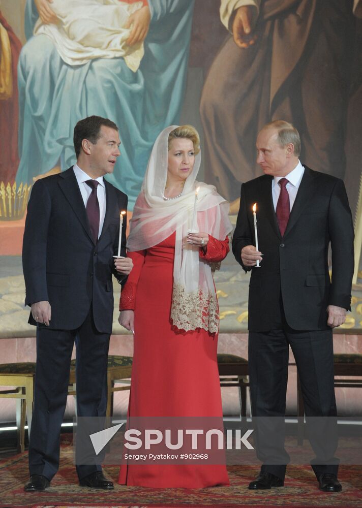 Dmitry Medvedev and Vladimir Putin attend Easter service