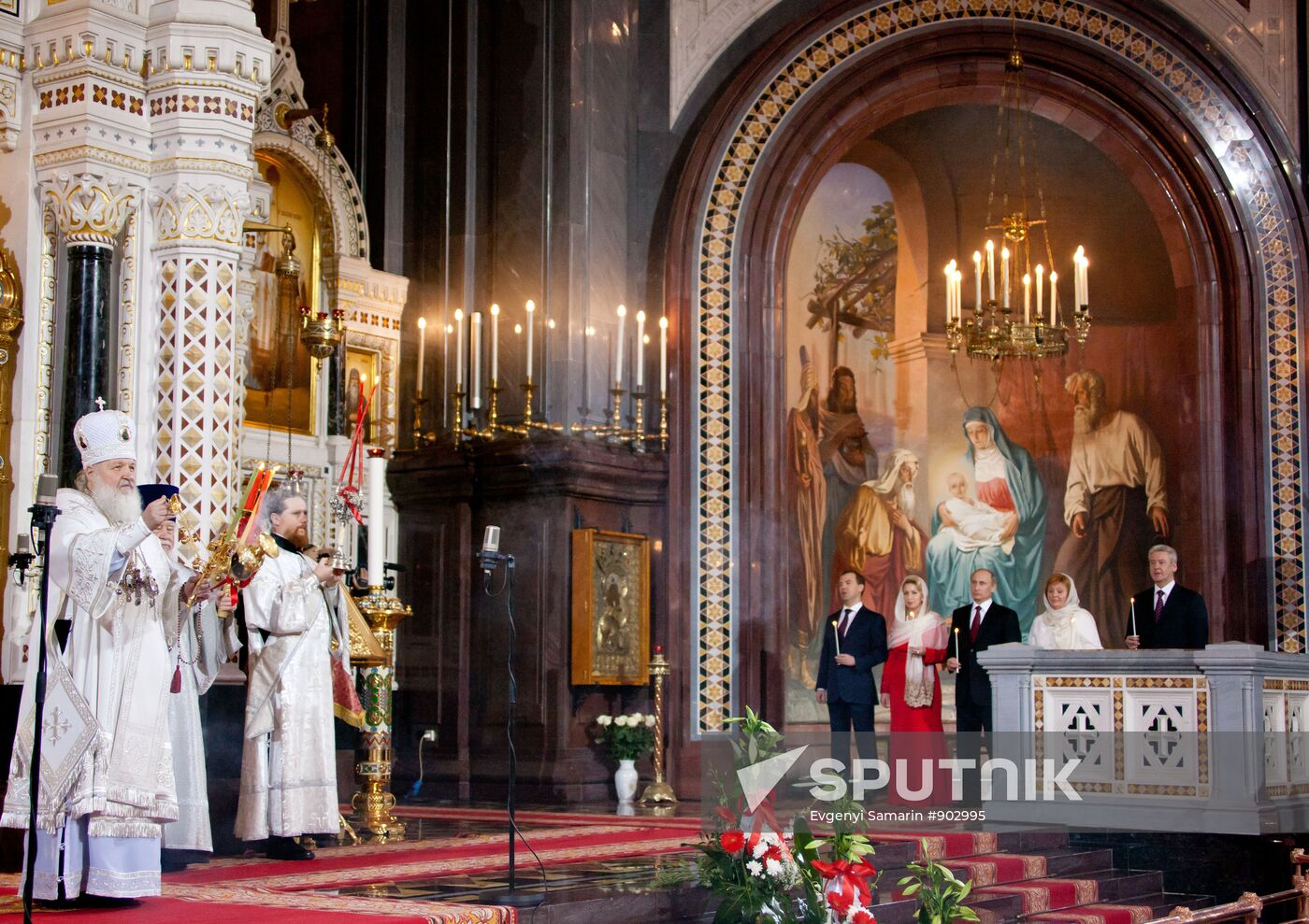 Dmitry Medvedev and Vladimir Putin attend Easter service