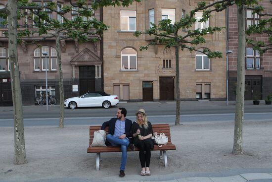 Citizens on an embankment in Dusseldorf