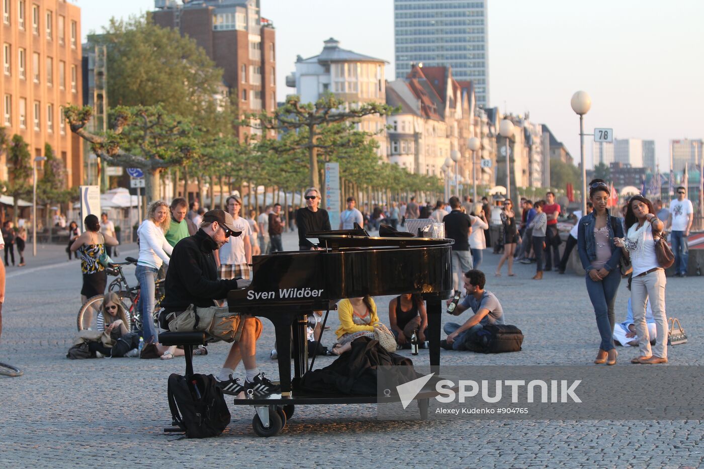 Citizens on an embankment in Dusseldorf