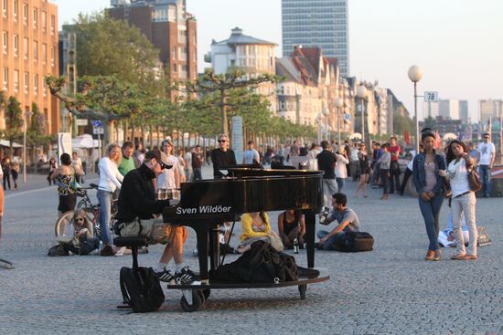Citizens on an embankment in Dusseldorf