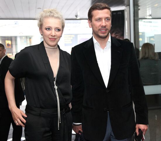 Andrei Merzlikin with his wife Anna