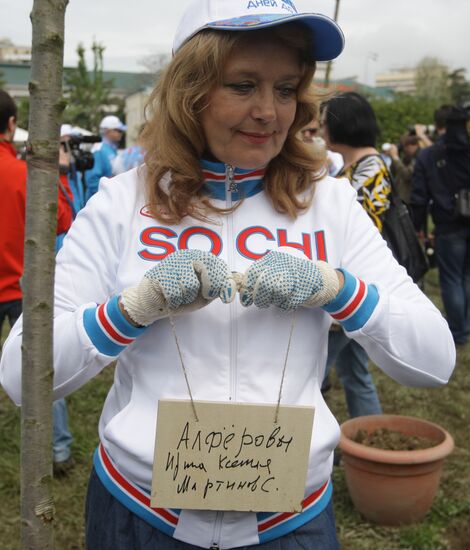 Irina Alfyorova attends wild cherry forest planting