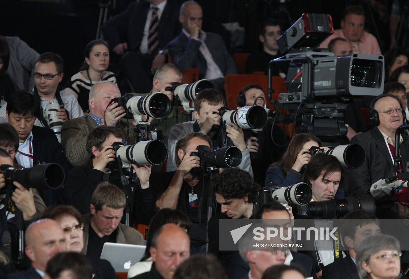 Photo correspondents at news conference with Dmitry Medvedev