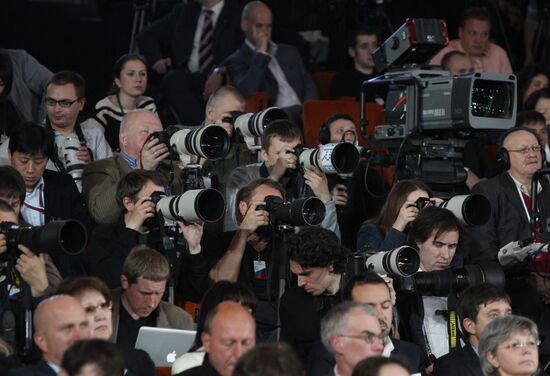 Photo correspondents at news conference with Dmitry Medvedev