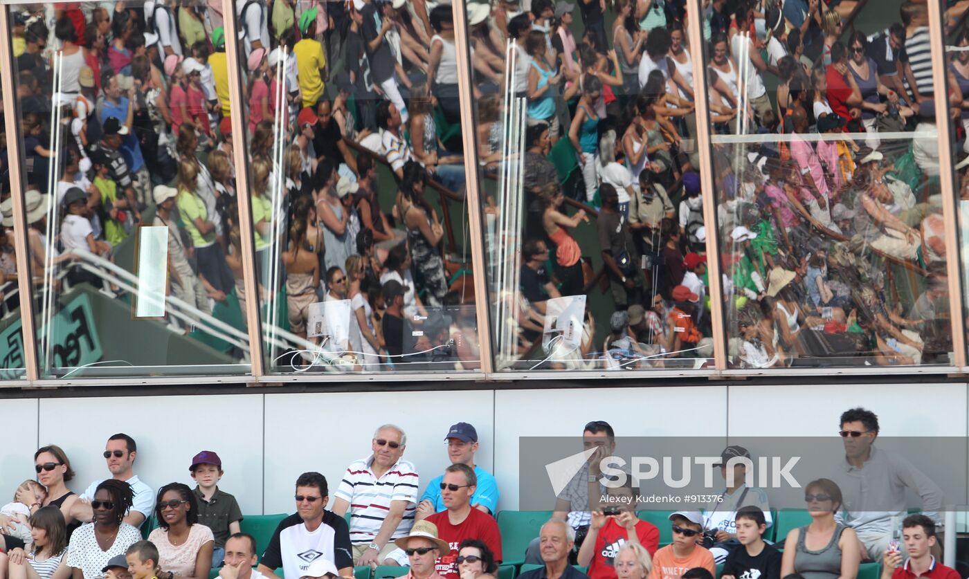 Spectators in grandstands at Philip Shatrie court Roland Garros