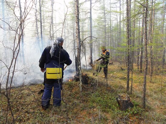 Fire crews battle wildfires in Yakutsk