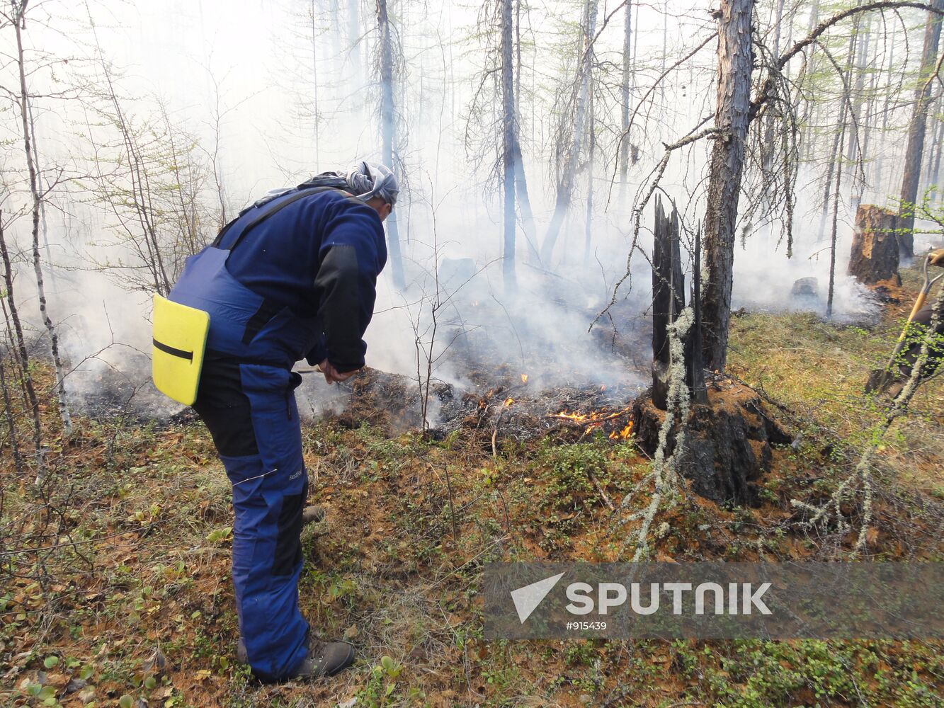 Fire crews battle wildfires in Yakutsk