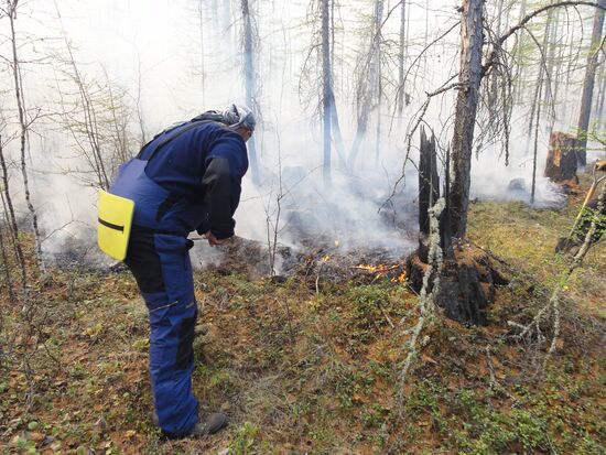 Fire crews battle wildfires in Yakutsk