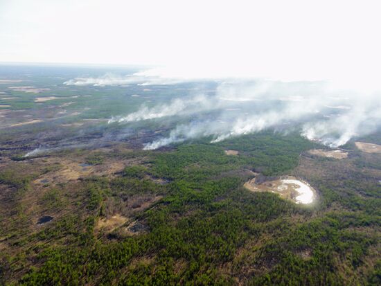 Fire crews battle wildfires in Yakutsk