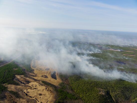 Fire crews battle wildfires in Yakutsk