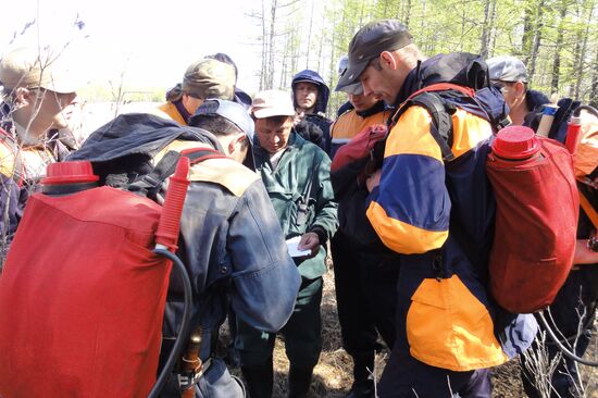 Fire crews battle wildfires in Yakutsk