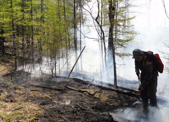 Fire crews battle wildfires in Yakutsk