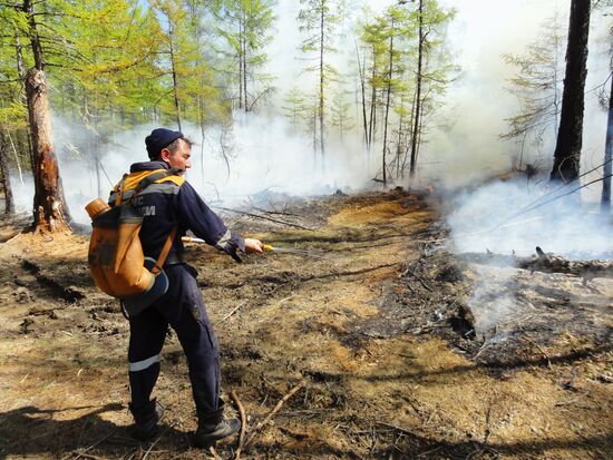 Fire crews battle wildfires in Yakutsk