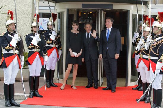 Nicolas Sarkozy, Carla Bruni, David Cameron