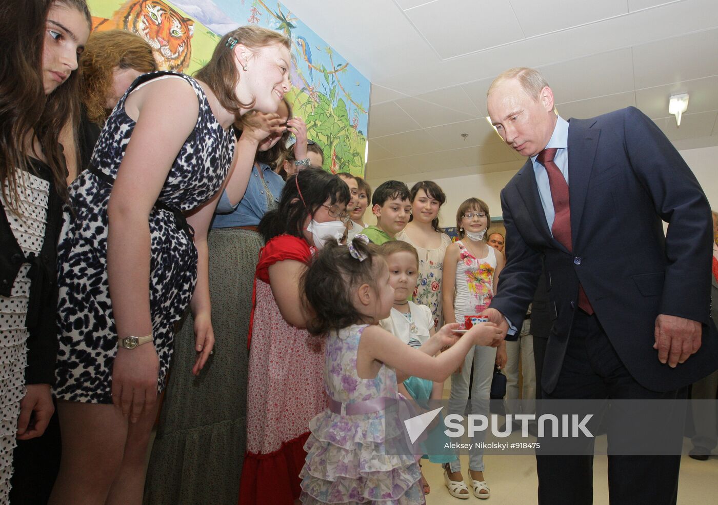 Vladimir Putin attends opening of children's medical center