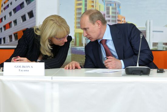 Vladimir Putin attends opening of children's medical center